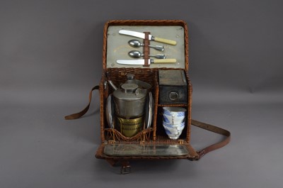 Lot 303 - An early to mid 20th century wicker picnic basket
