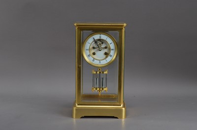 Lot 331 - An early 20th century French brass four glass striking mantle clock