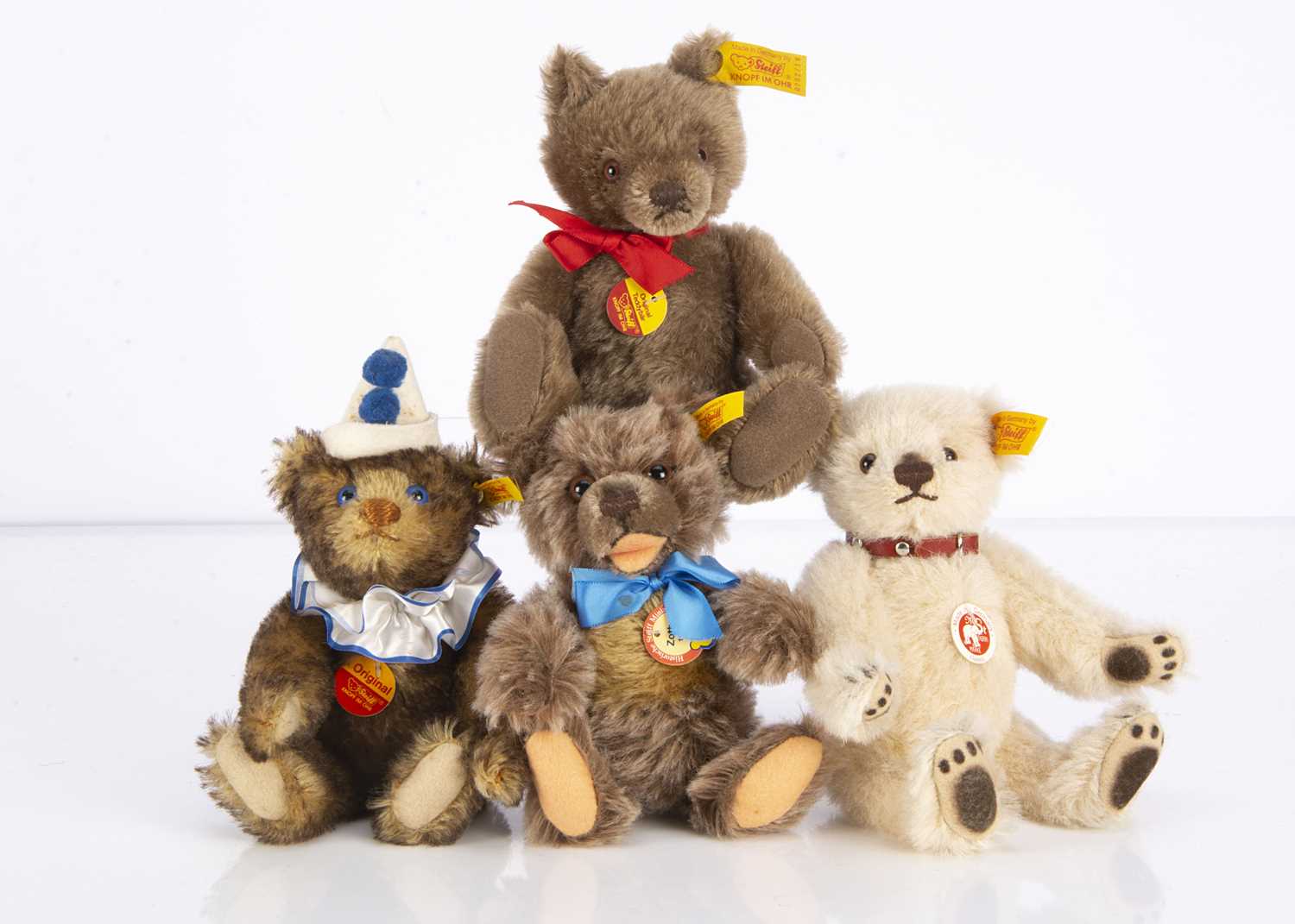Lot 43 - Four small Steiff yellow tag teddy bears