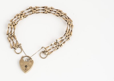 Lot 31 - A 9ct gold three bar twist gate link bracelet