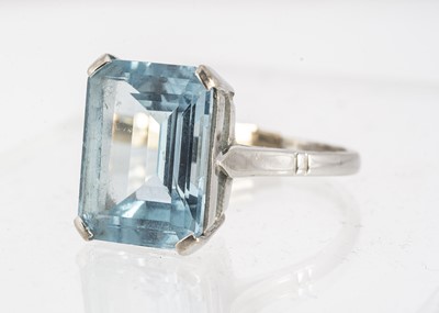 Lot 49 - An 18ct white gold topaz dress ring