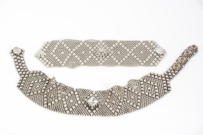 Lot 52 - A contemporary chrome plated American chocker necklace and matching bracelet