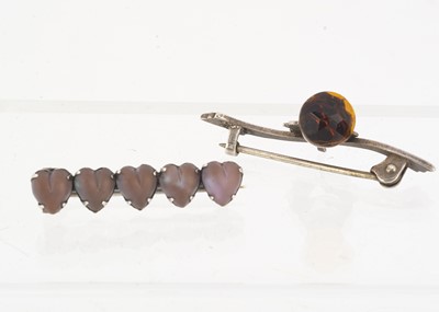 Lot 86 - A silver and sapphire bar brooch