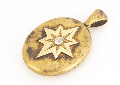Lot 93 - A Victorian yellow metal oval old cut diamond set locket