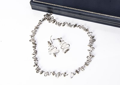Lot 188 - A 1970s silver suit of jewellery
