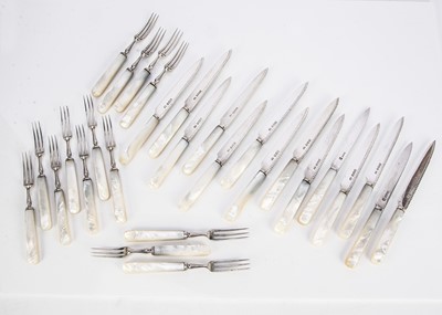 Lot 409 - An harlequin set of Victorian silver and mother of pearl dessert knives and forks
