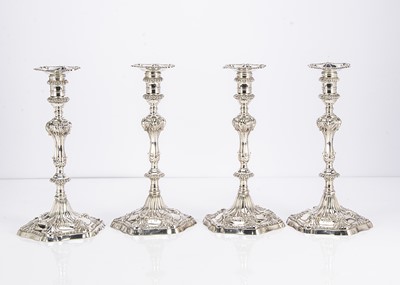 Lot 452 - A fine set of four George III cast silver candlesticks by Ebenezer Coker