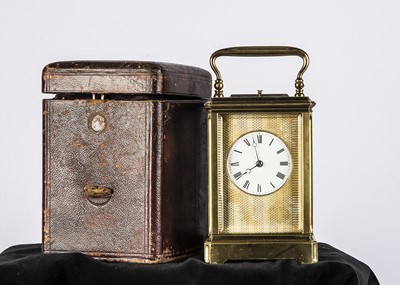 Lot 6 - A late Victorian or Edwardian brass carriage repeater timepiece