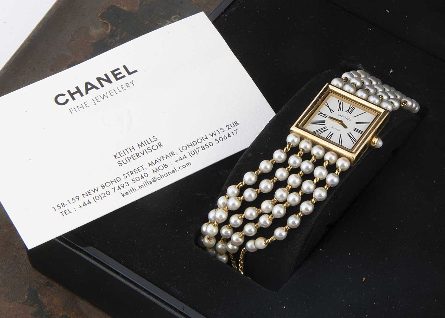 Lot 89 - A 1980s Chanel Madamoiselle 18ct gold and pearl quartz wristwatch