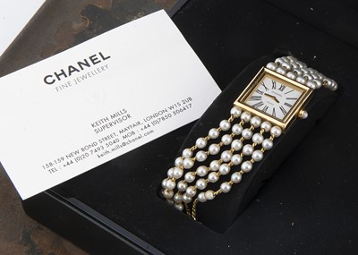 Lot 89 - A 1980s Chanel Madamoiselle 18ct gold and pearl quartz wristwatch