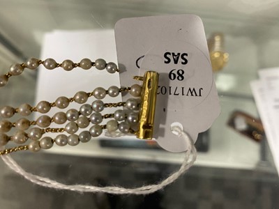 Lot 89 - A 1980s Chanel Madamoiselle 18ct gold and pearl quartz wristwatch