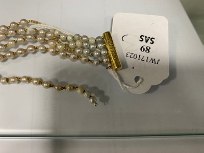 Lot 89 - A 1980s Chanel Madamoiselle 18ct gold and pearl quartz wristwatch