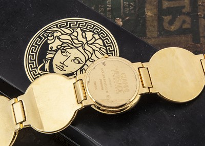 Lot 107 - A modern Gianni Versace gold plated wristwatch