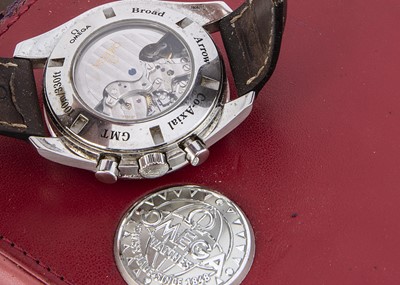 Lot 157 - IMPORTANT ANNOUNCEMENT: PLEASE NOTE THIS IS A SPEEDMASTER: A modern Omega GMT Seamaster Co-Axial Chronometer automatic stainless steel wristwatch