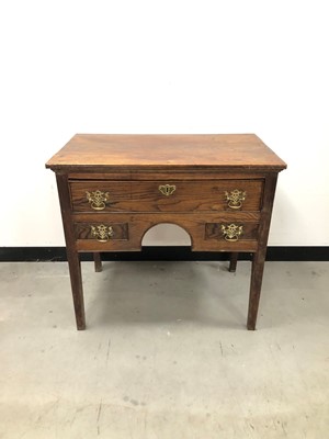 Lot 17 - A small early 19th century oak low boy