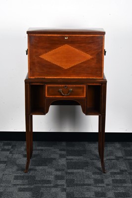 Lot 27 - An Edwardian mahogany bonheur du jour writing desk