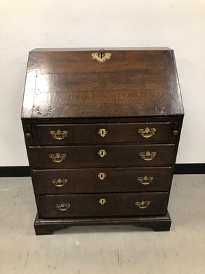 Lot 36 - A Georgian and later oak bureau