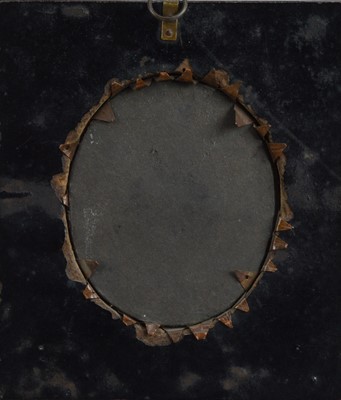 Lot 137 - A 19th century Portrait miniature on ivory of a  young lady by a window