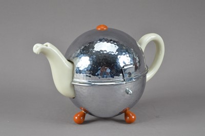 Lot 184 - A circa 1950's German teapot in stand by WMF