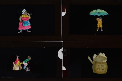 Lot 23 - Mahogany-Mounted Slipping Magic Lantern Slides