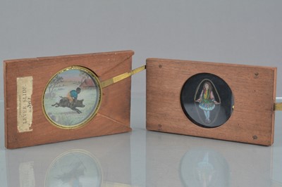 Lot 25 - Mahogany-Mounted Lever-Action Magic Lantern Slides