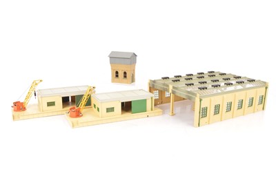 Lot 255 - Pair of Hornby-Dublo 00 Gauge 2-Rail plastic kitbuilt Goods Depots and 4- Road Engine Shed (4)