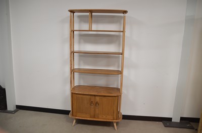 Lot 32 - A c1970s Ercol bookcase and storage unit