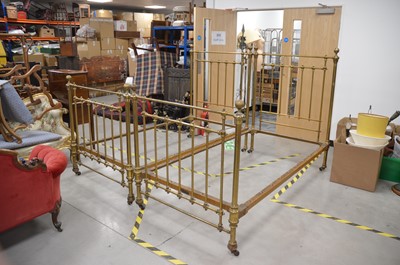 Lot 33 - Two first half 20th century brass and cast iron single bed frames