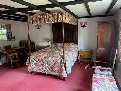 Lot 66 - An antique and later four poster bed