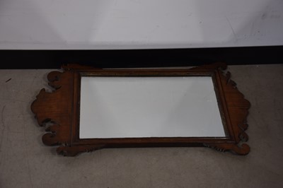 Lot 75 - A late Georgian mahogany fret carved wall mirror