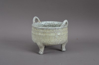 Lot 211 - A Chinese crackled glazed twin-handled footed pot