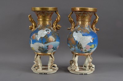 Lot 216 - A pair of Chinese damaged twin handled vases/covers