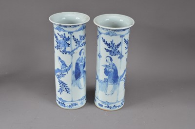 Lot 219 - A pair of late 19th/early 20th century Chinese blue and white porcelain sleeve vases