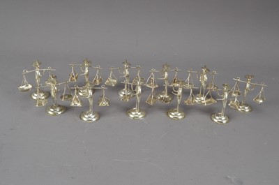 Lot 229 - A collection of Chinese white metal figures
