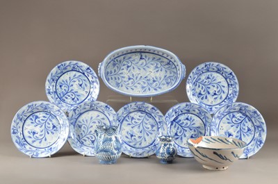 Lot 253 - A collection of tin glazed earthenware dinner items