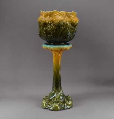 Lot 262 - A ceramic jardinière and stand
