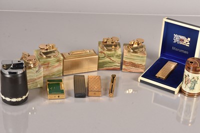 Lot 70 - A collection of pocket and table lighters