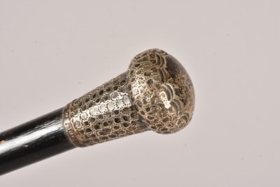 Lot 82 - A silver topped walking cane