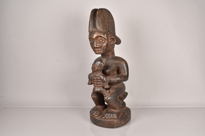 Lot 271 - An African Maternity Figure