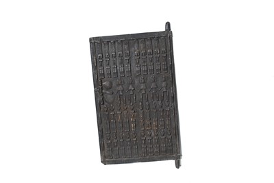 Lot 278 - An African carved wooden door