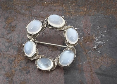 Lot 68 - A moonstone and silver wreath brooch