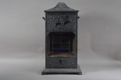 Lot 211 - A cast metal aesthetic movement lantern