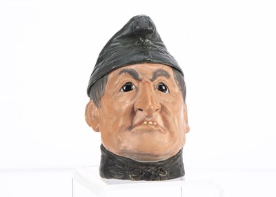 Lot 361 - A 19th century German composition miser tobacco jar