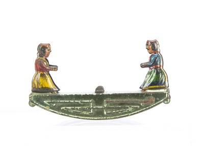 Lot 381 - A German Penny Toy two girls on rocker