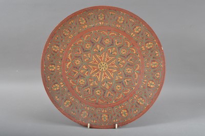 Lot 46 - A turn of the century painted continental stoneware charger