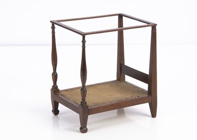Lot 650 - An early 19th century dolls’ house mahogany four-poster bed