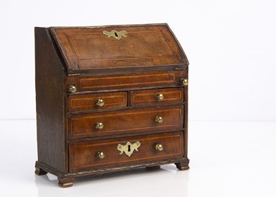Lot 667 - A 19th century apprentice walnut veneered oak bureau