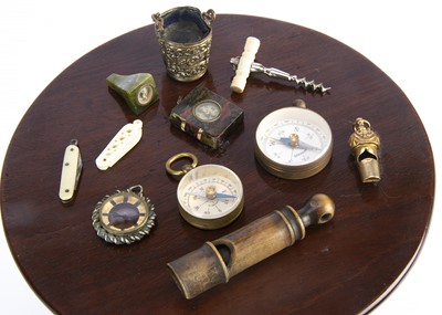 Lot 701 - Whistles and compases