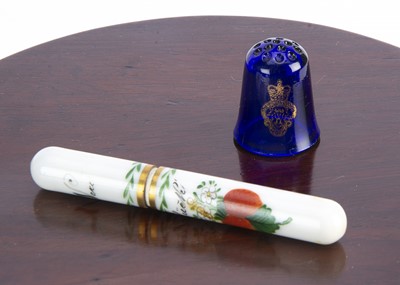 Lot 714 - A 19th century German milk glass needle case