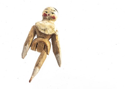 Lot 758 - A tiny late 19th century dolls’ house Grodnerthal wooden doll